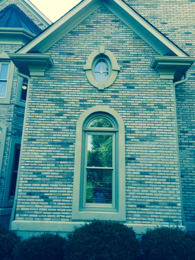 Oval and arched window replacement in Piper Glen by Belk Builders