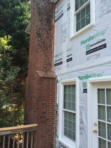 Huntersville in progress Hardie® Plank siding replacement