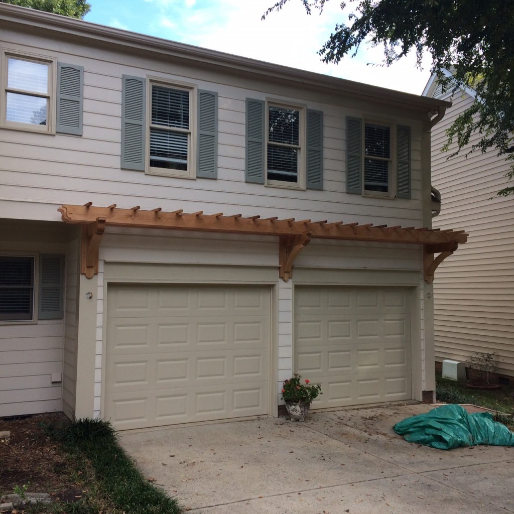 Belk Builders Cedar Trellis Installation over South Charlotte garage