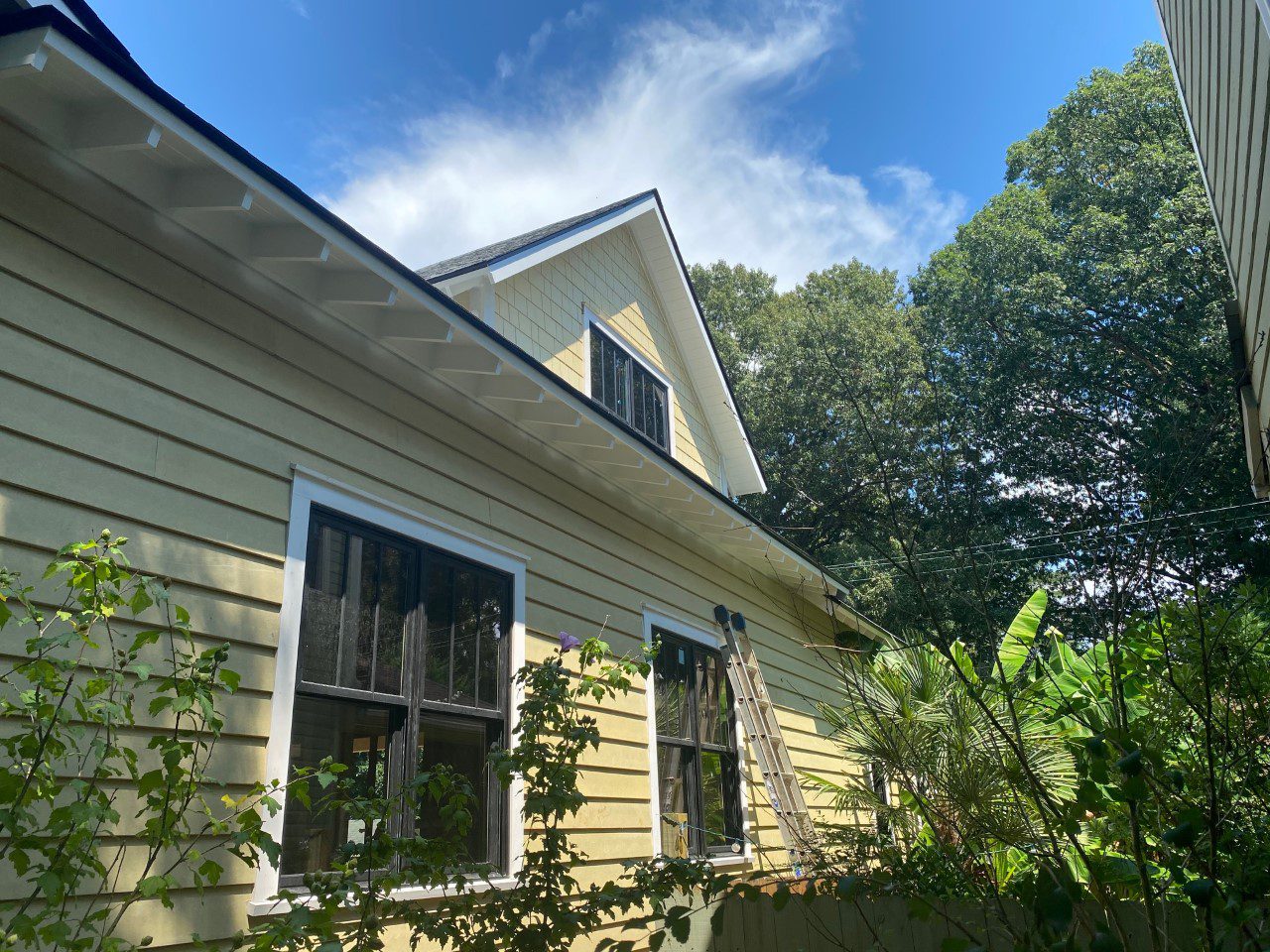 charming cottage style home with artisan siding charlotte