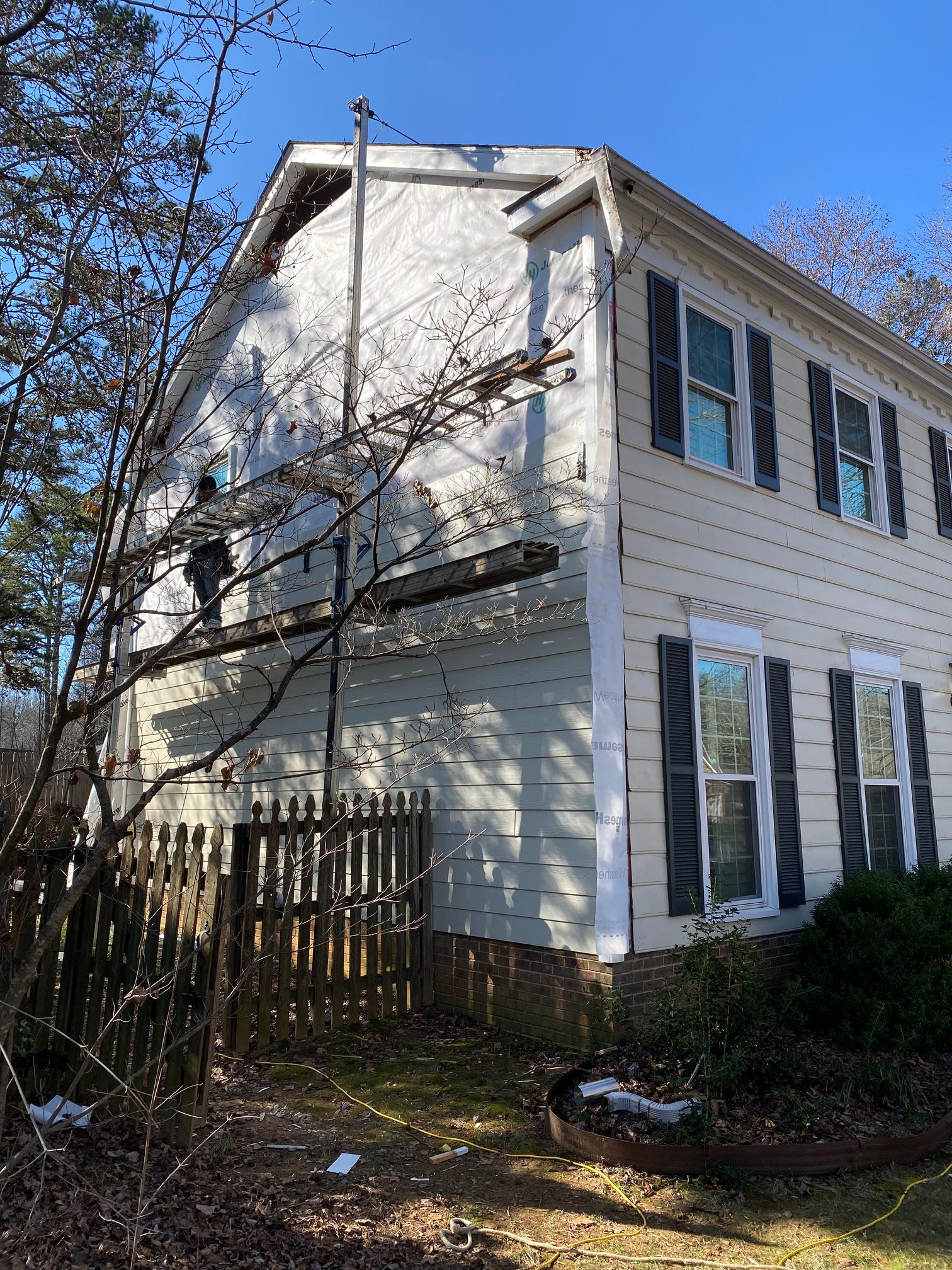 During Charlotte Hardie® Plank Siding installation