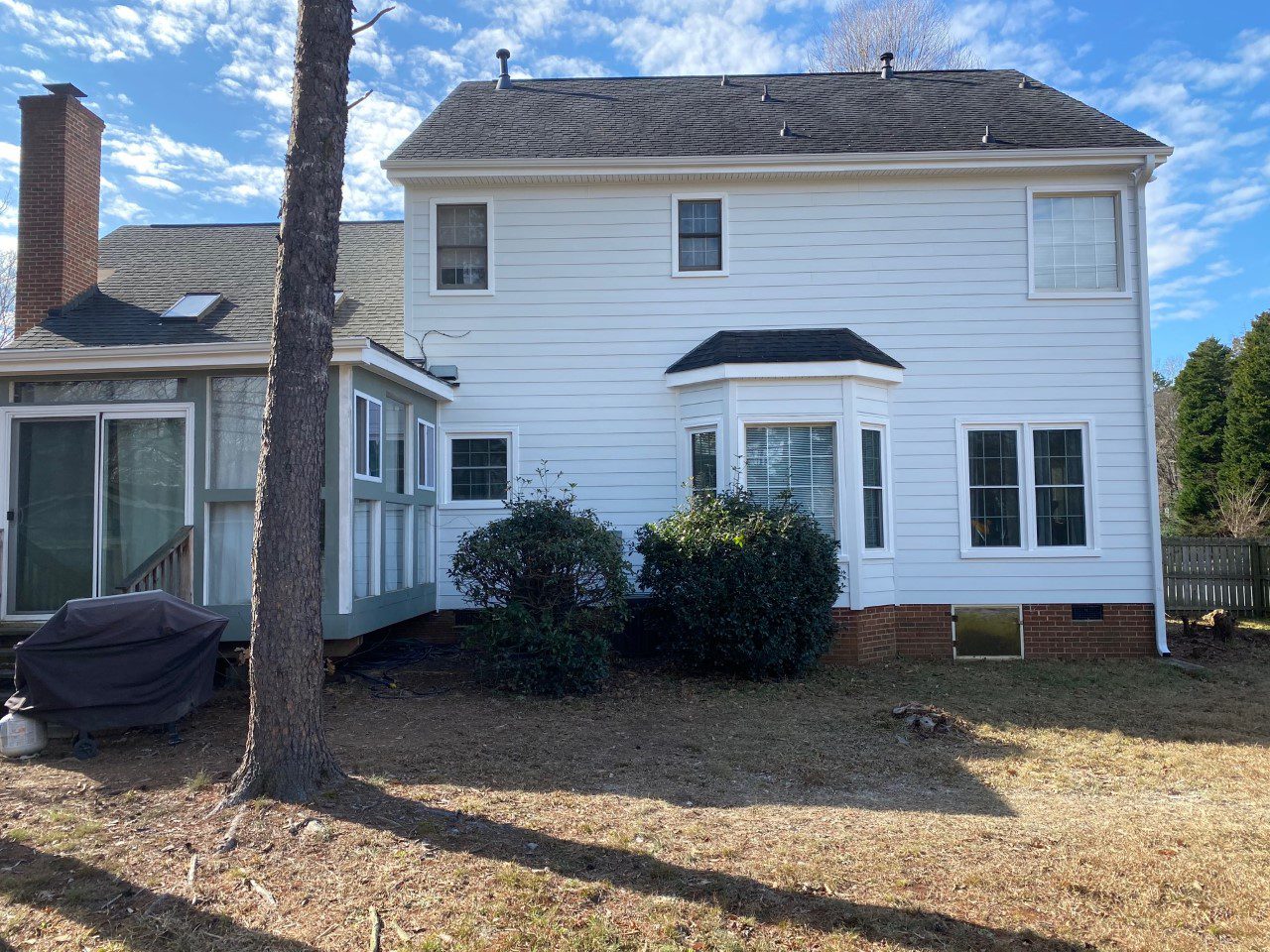 Back of home with new Hardie® Plank siding and vinyl soffit