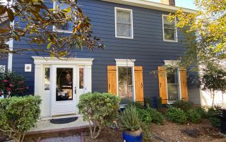 completed Hardie® Plank with cedar shutters