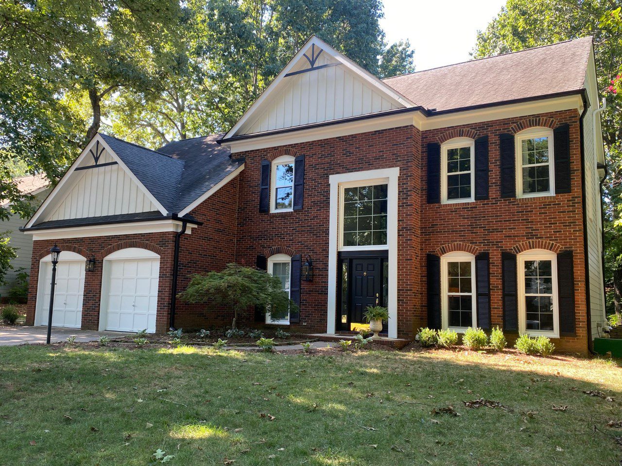 Completed Hardie® Plank siding installation, new gutters, trim and windows